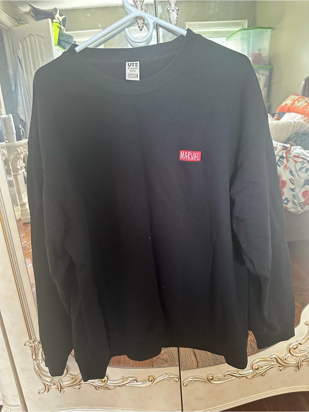 Uniqlo Black Sweatshirt with Red Marvel Patch